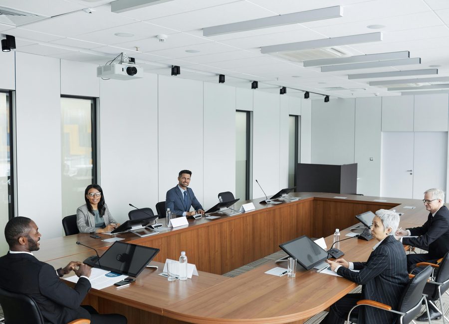 Boardroom meeting space with business professionals